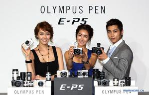 Olympus將集中資源開發無反光鏡相機（source: www.news.cn) BigPic:900x574